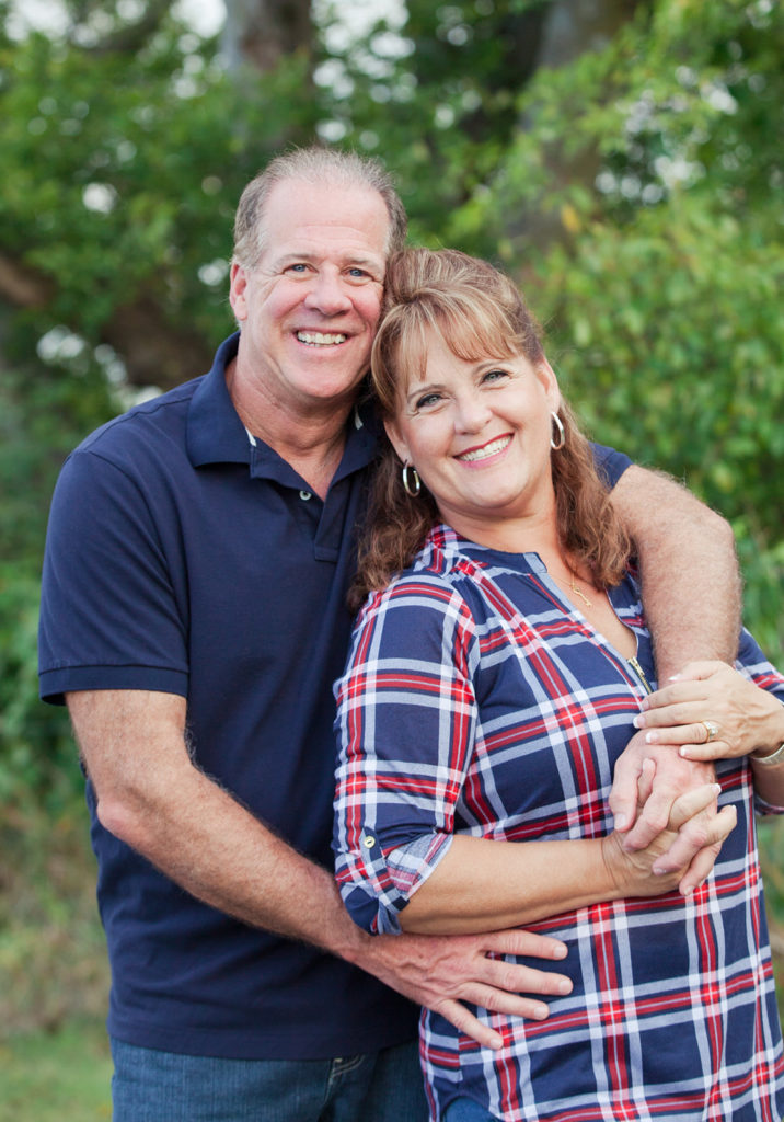 blog intro-Man hugging wife from behind both smiling