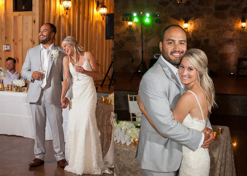 Bride and groom holding hands and hugging at wedding reception